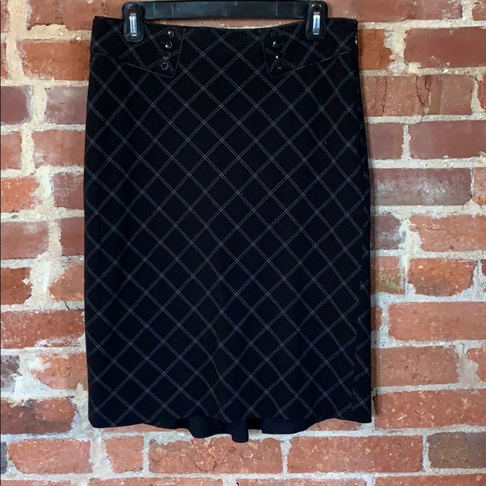 Dressy black patterned skirt.